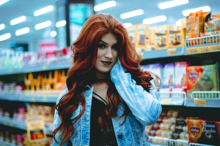 Person in a clean, well-lit store aisle, highlighting organized shelves with snacks, aligning with the theme of maintaining an inviting retail space.